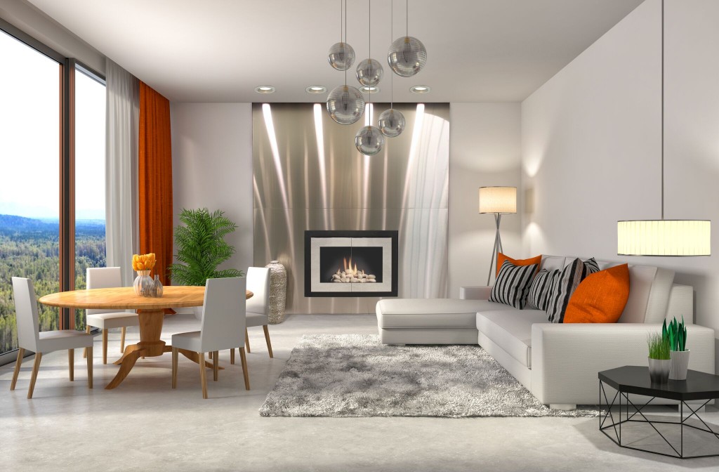Le chauffage par zone peut se réaliser avec un foyer au gaz. Cet appareil a été décoré avec des panneaux décoratifs Stoll.